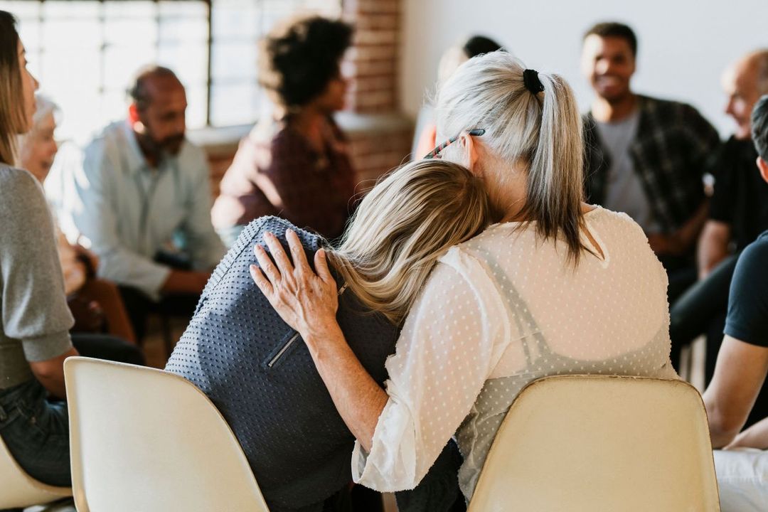 A group of individuals participating in a treatment session for mental health.